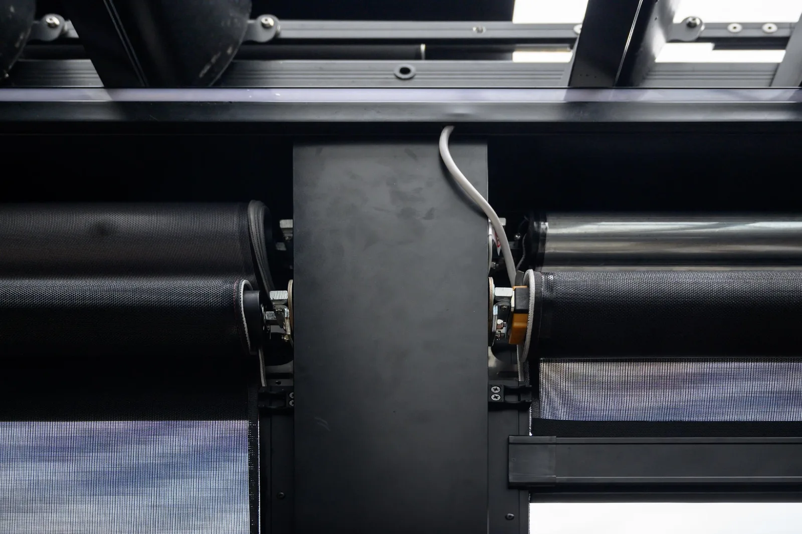 Inside the head of motorised EasyTrack blinds, showing the rollers and the motor