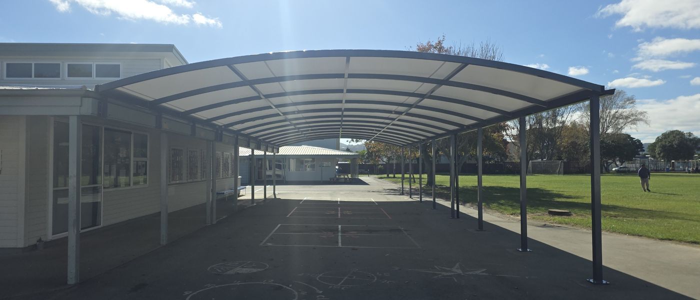 Arched tension canopy walkway installed at a New Zealand school